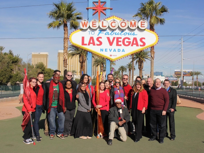 AFAN Executives and community members turn "Welcome to Fabulous Las Vegas Sign Red