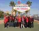 AFAN Executives and community members turn "Welcome to Fabulous Las Vegas Sign Red